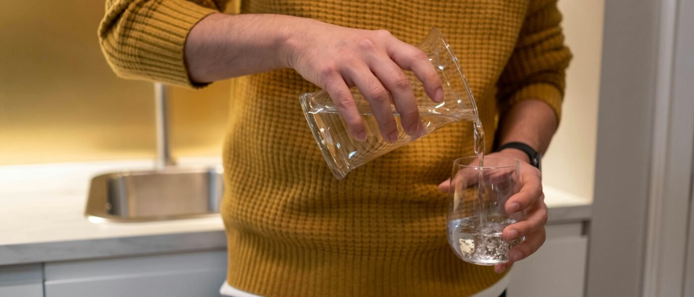 Man pouring water